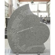 Roses i làpida d’ocells